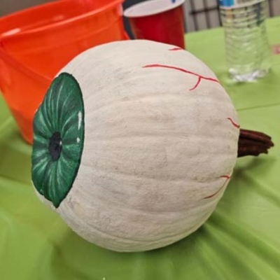 pumpkin painted to look like bloodshot eyeball