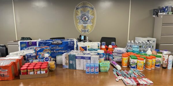 table covered with food and hygiene items