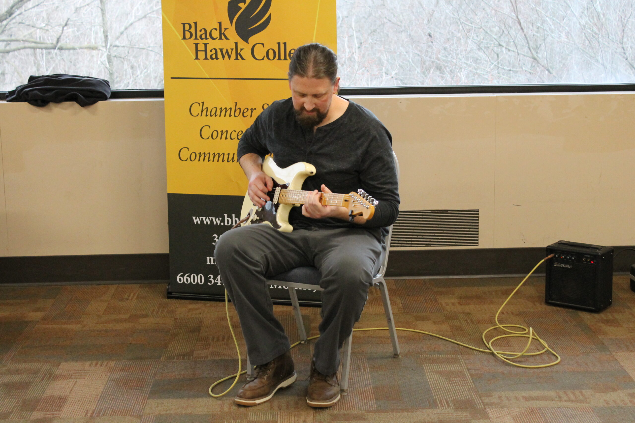 Colin Grennan playing the guitar