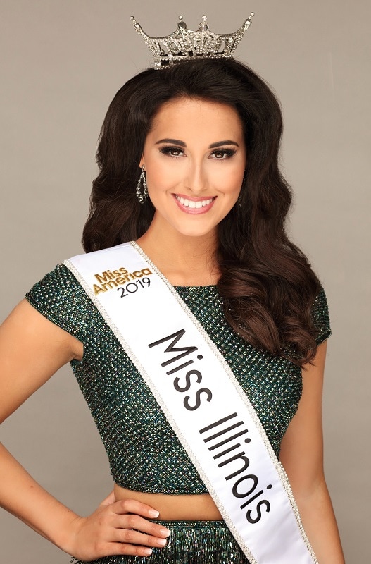 woman wearing crown and Miss Illinois sash