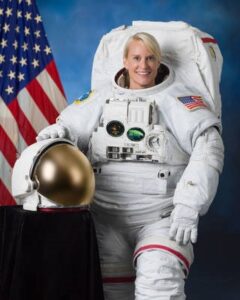 Dr. Kate Rubins wearing NASA astronaut suit