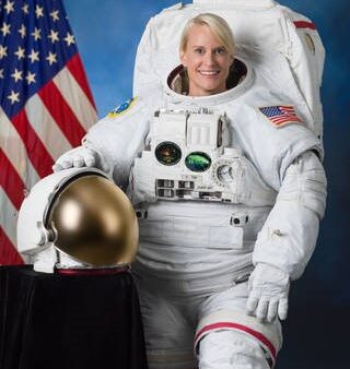 Dr. Kate Rubins wearing NASA astronaut suit