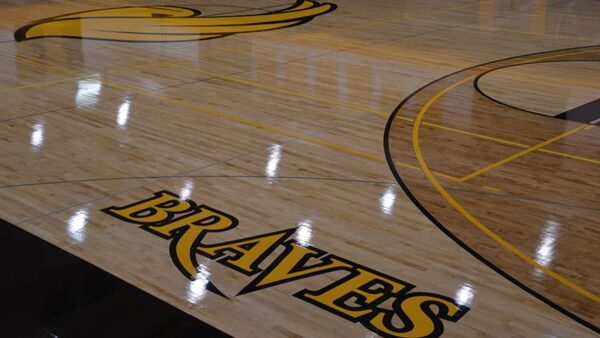 View of the basketball court with logos showing