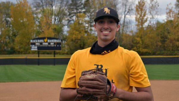 baseball player in the Black Hawk College field