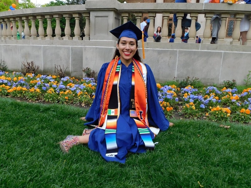 University of Illinois graduate in her cap and gown