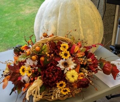 white pumpkin and fall floral decor