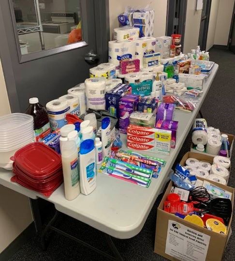 variety of kitchen & toiletry items on table