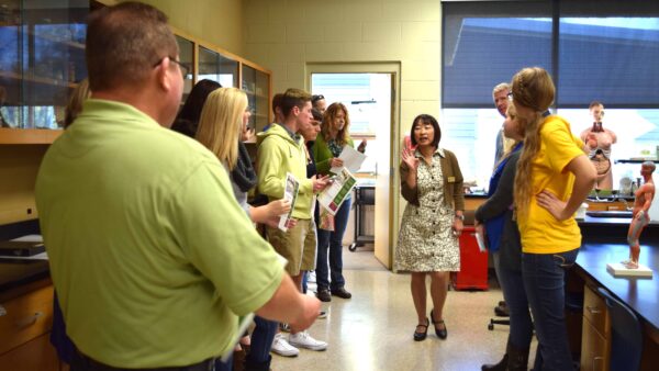 Faculty member giving a tour of a science lab