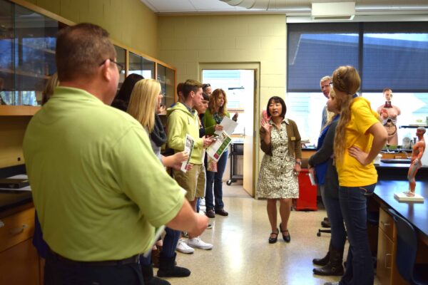 Faculty member giving a tour of a science lab