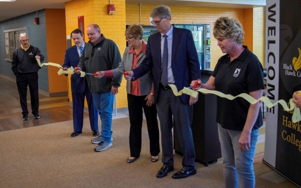 6 people at a ribbon-cutting ceremony