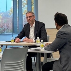 Illinois state treasurer Mike Frerichs talking while seated at table