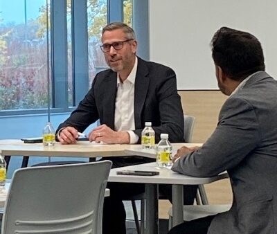 Illinois state treasurer Mike Frerichs talking while seated at table