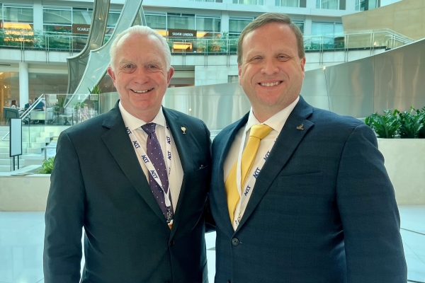 Dr. Keith Miller & Dr. Jeremy Thomas standing together and smiling at camera