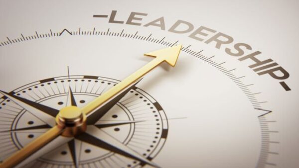 compass pointing to the word leadership