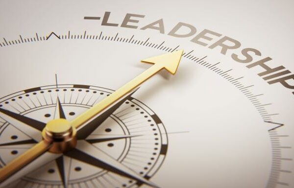 compass pointing to the word leadership