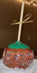 pumpkin painted to look like caramel apple