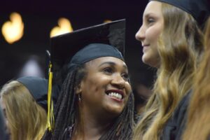 Tamica Reynolds wearing her graduation cap