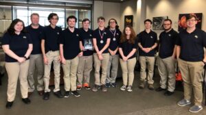 group of students with 1st place plaque