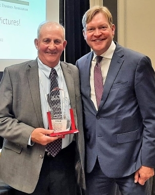 Steve Spivey and Bob Thompson with award