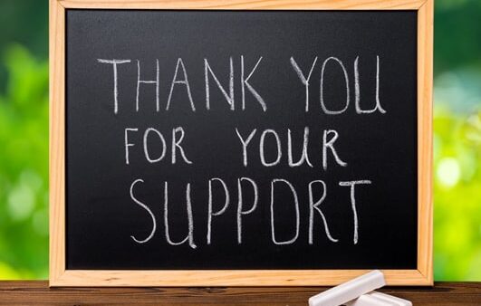 thank you for your support written on chalkboard