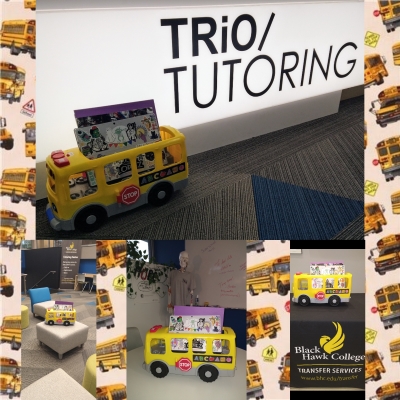 plastic toy school bus with full-size folders in it