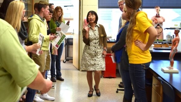 Faculty member giving a tour of a science lab