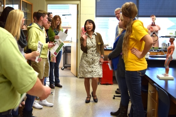 Faculty member giving a tour of a science lab